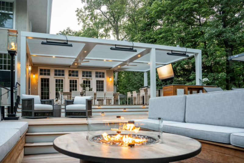 Attached StruXure pergola with firepit