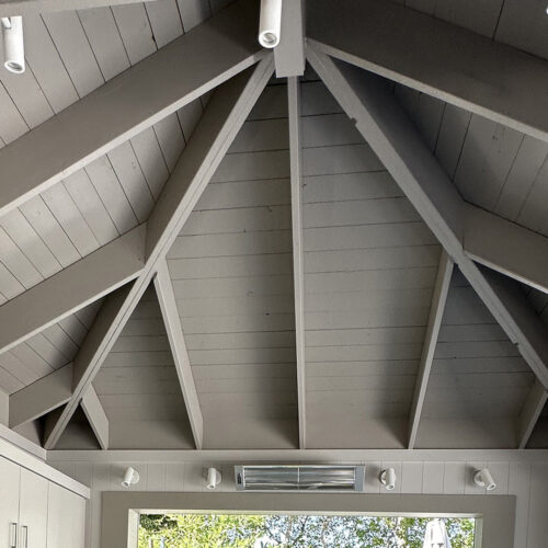 Open air patio and bar with vaulted ceiling constructed with ACRE wood alternative